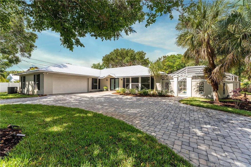 Front with circular driveway.