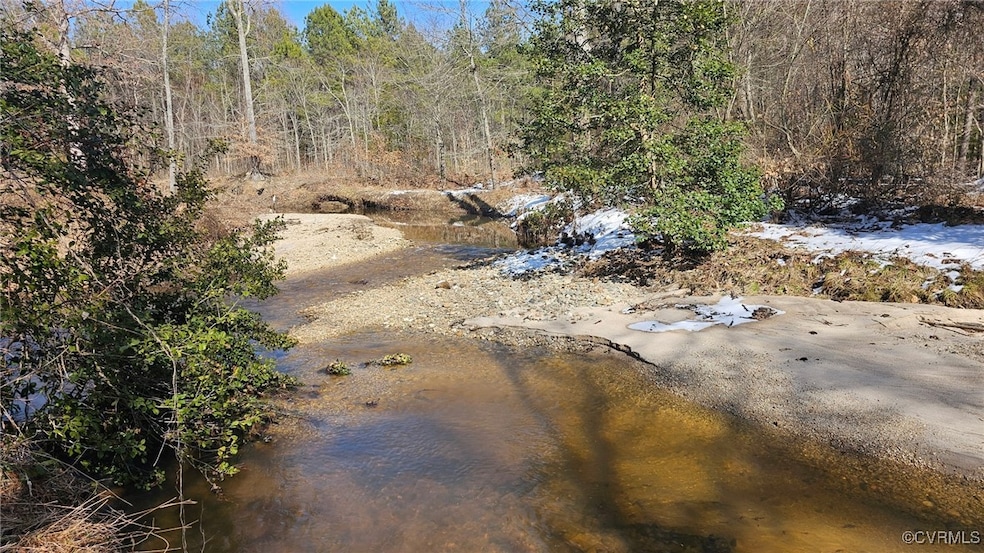 View of landscape with a wooded view