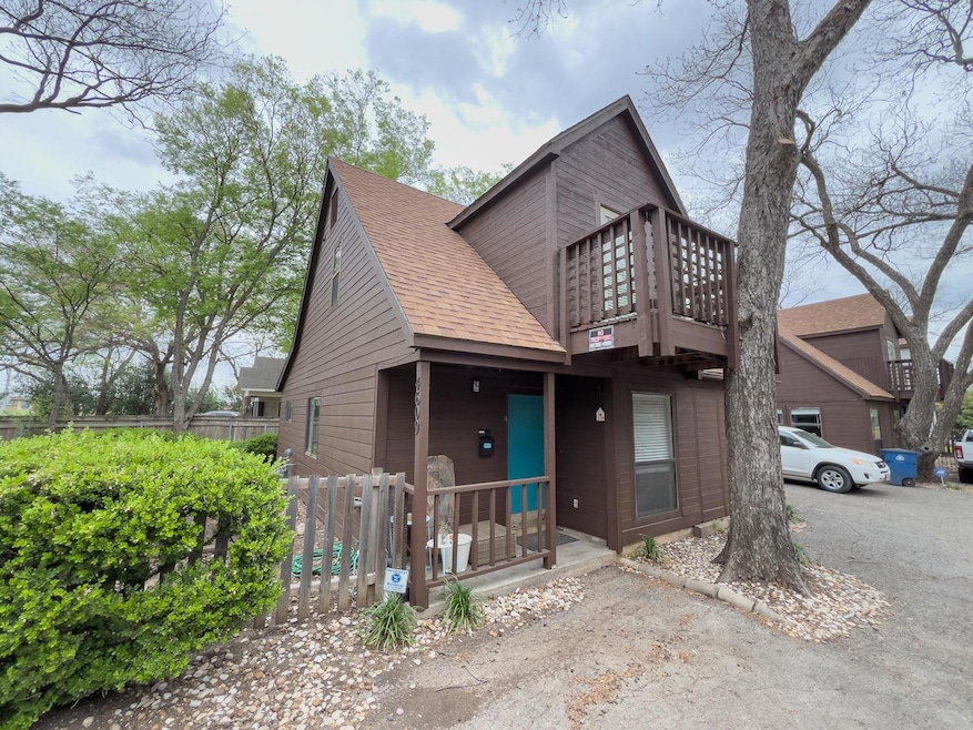 View of front of property with roof with shingles