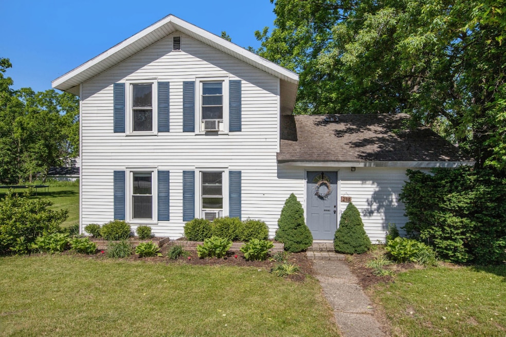 230 S Hudson St, Lowell, MI 49331 - photo 1