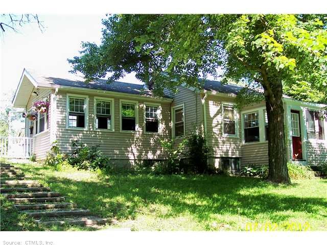 Exterior Front. Cozy ranch with pretty view of Cry