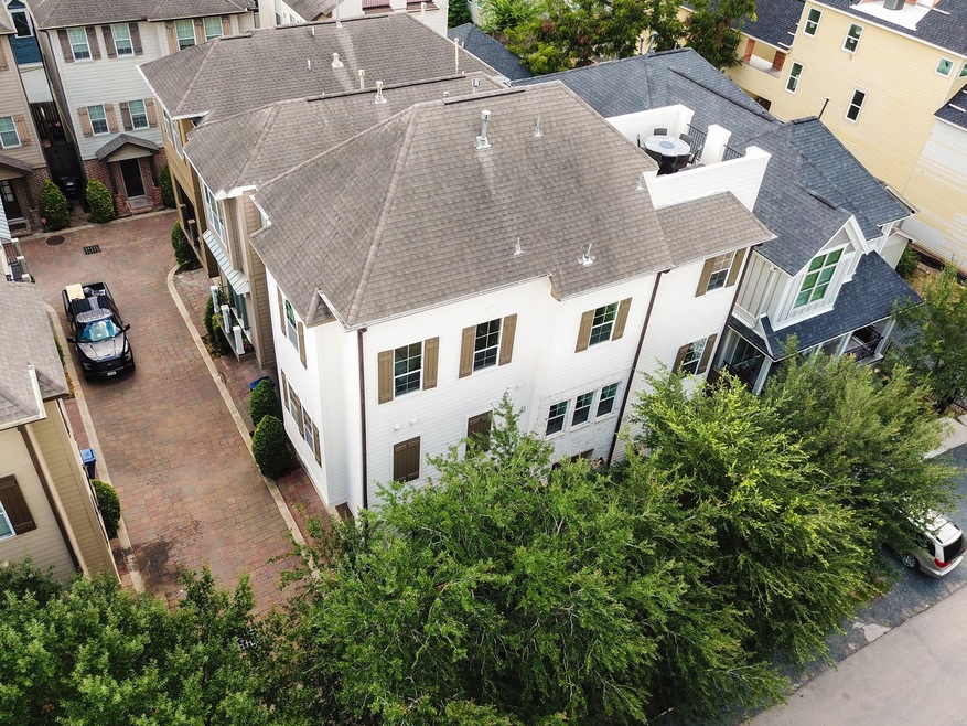 Spacious end unit in the Heights has lots of natur
