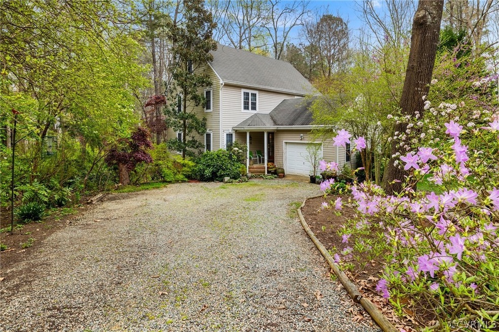 View of front of property with a garage. House is