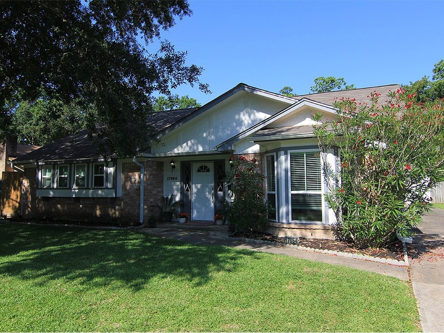 17054 Gleneagle!! Driveway leads to the 2 car detached garage and fenced in back yard/ patio space.
Notice the new roof & gutters!!