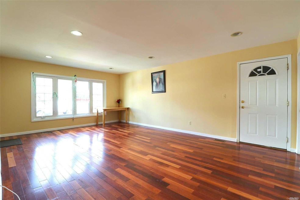 8142 243rd St unit 1st Fl, Bellerose, NY 11426 - photo 1