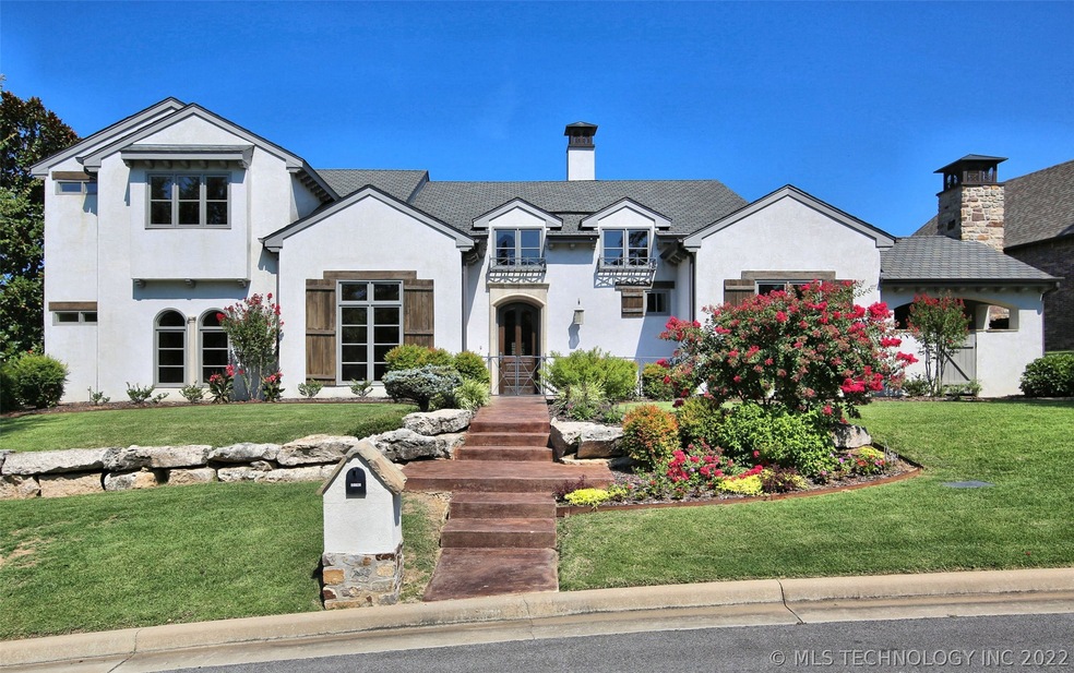 Beautiful landscaping and colors adorn with front