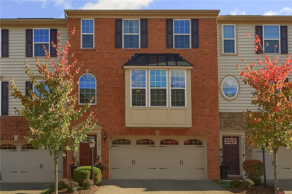 Front of townhouse with plenty of parking for gues