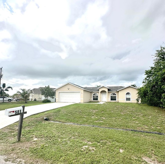 581 SW Fields Ave, Port Saint Lucie, FL 34953 - photo 1