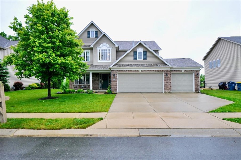 Beautiful Traditional Style home with a 3 car garage and covered front porch.