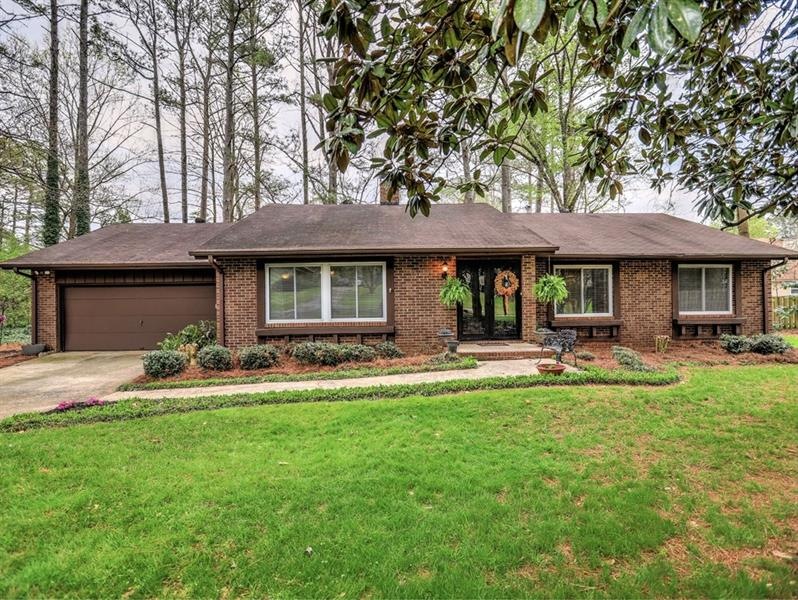 Beautiful brick ranch on level lot.