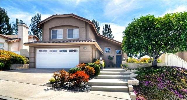 Fantastic curb appeal with grand entry steps, fron