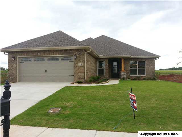 Full brick with hardi trim, Built with TVA Energy Right features which mean LOWER utilty bills, full sod, sprinkler system with seperate meter, Wrought iron front door