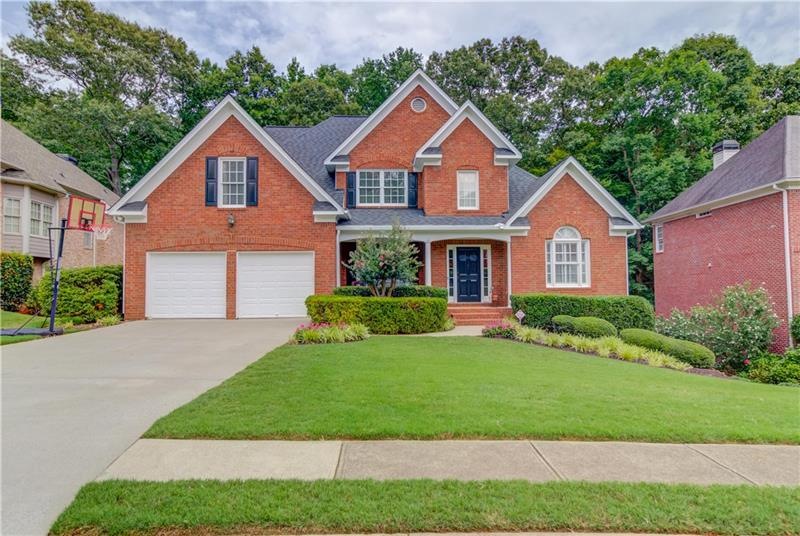 Welcome home to this 3 sided brick beauty!