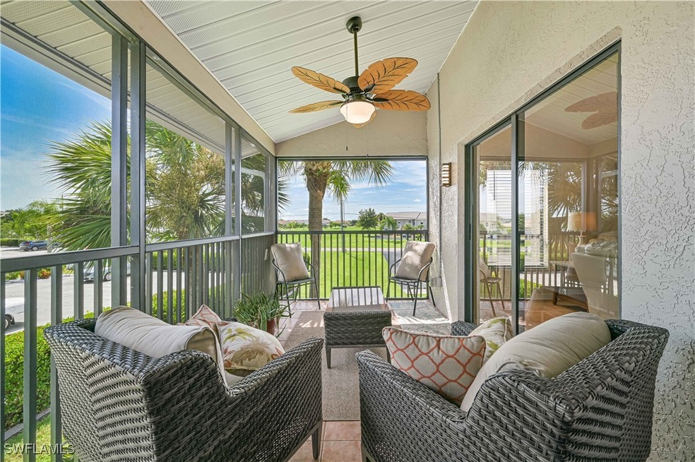 Sunroom featuring lofted ceiling and ceiling fan