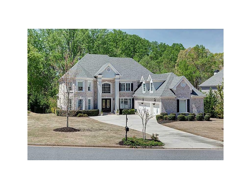 Exterior Front. Four side white brick European Sty