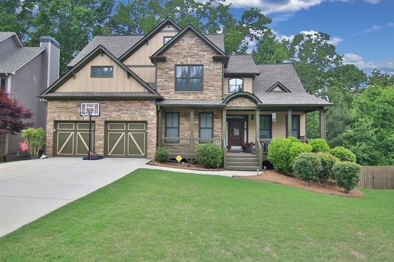 Beautiful stone and siding faade on this large fam