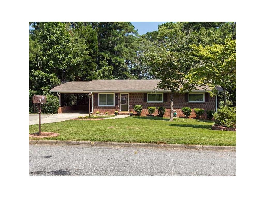 Exterior Front. Charming home on large lot.