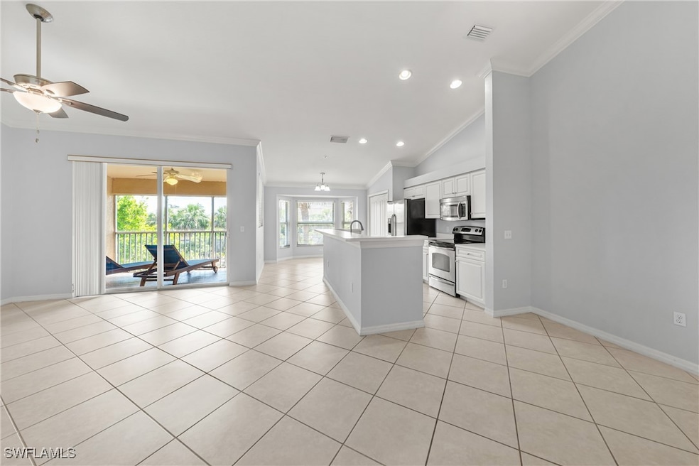 Kitchen with appliances with stainless steel finis