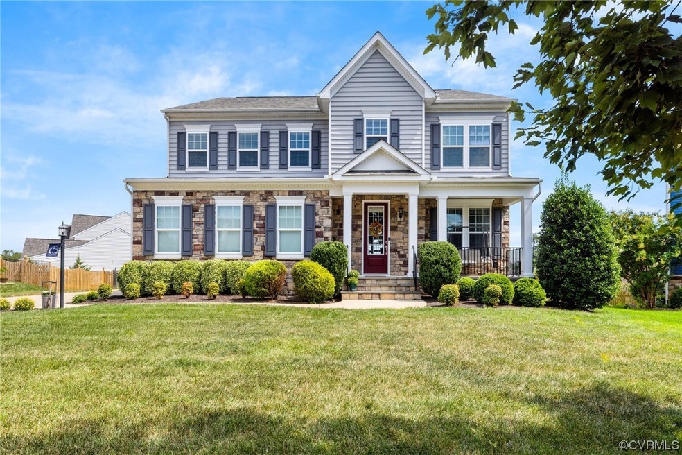 Front of house with  porch, front lawn, and sidelo