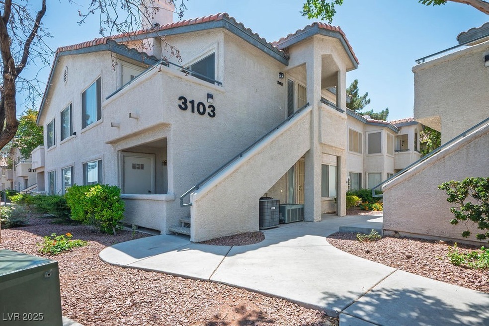 View of property with cooling unit and stairs