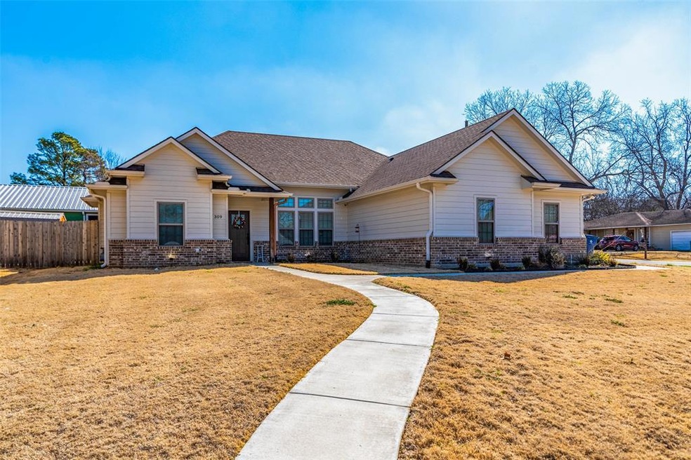 309 S Magnolia St, Pottsboro, TX 75076 - photo 1