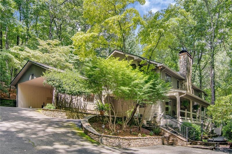 Welcome home!  This landmark Big Canoe home has un
