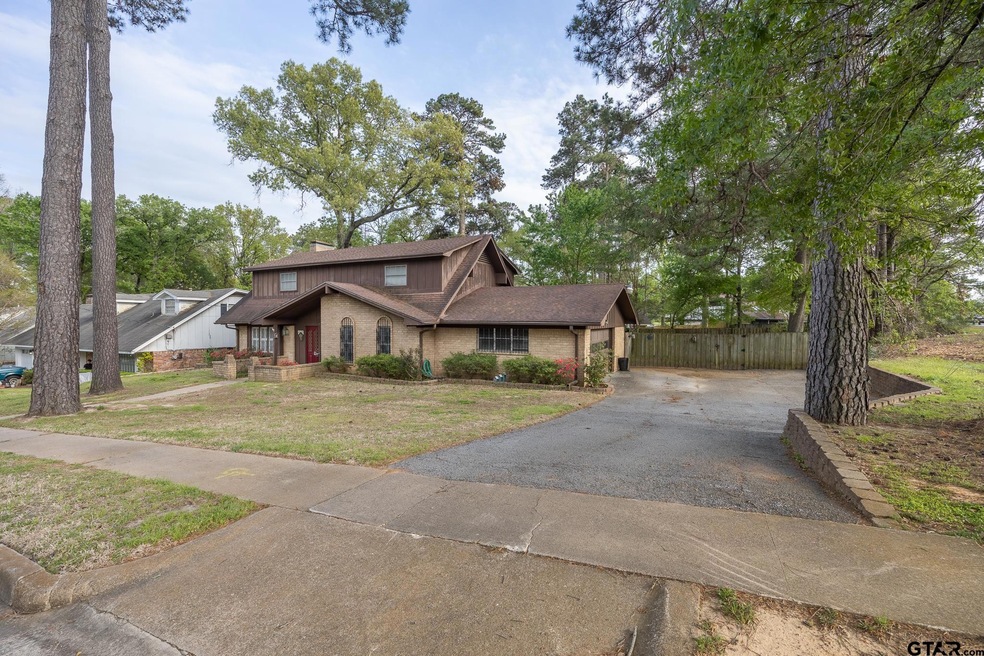 Large corner lot with shade trees