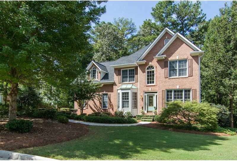 Exterior Front. Elegant living is Suwanee!
