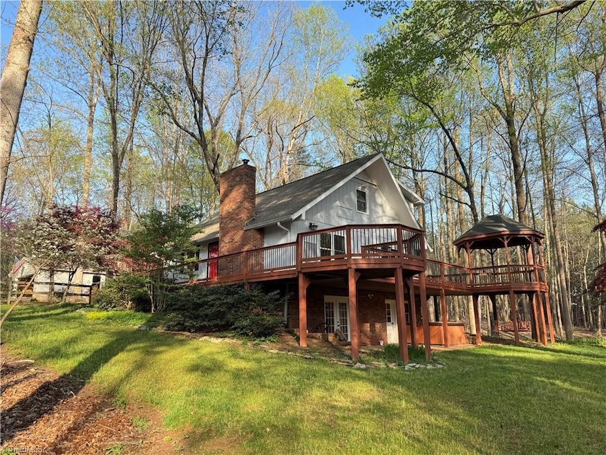 5 private acres, 2 car garage, 3 bedrooms, 3 full bath house, finished basement.