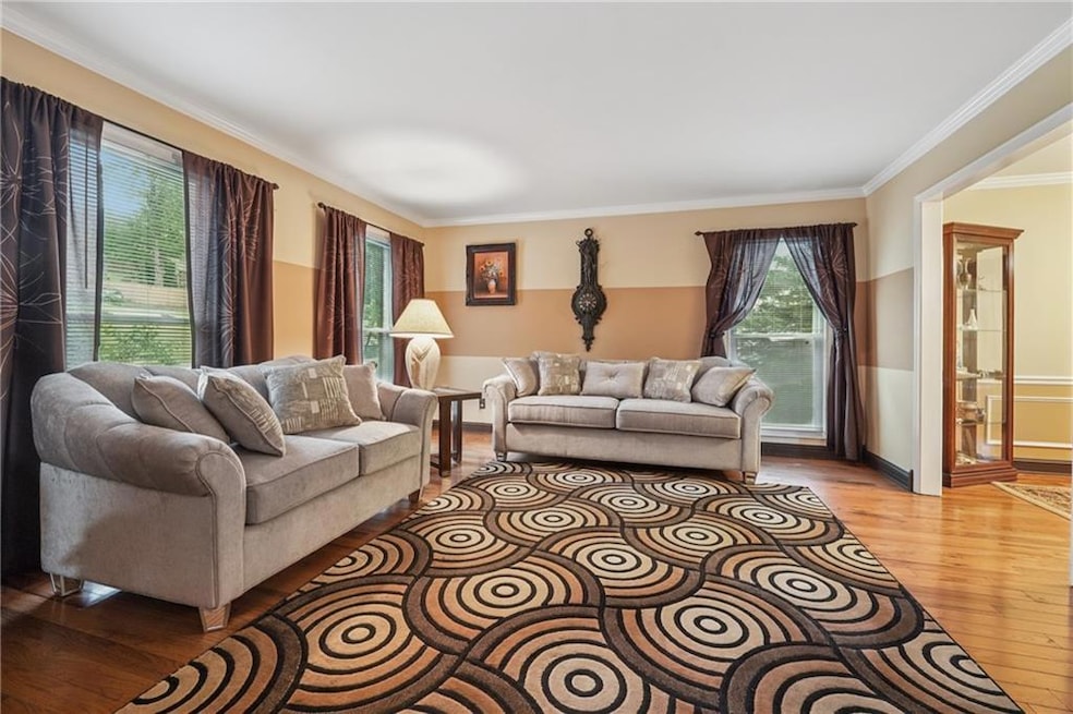 Living area with light hardwood flooring