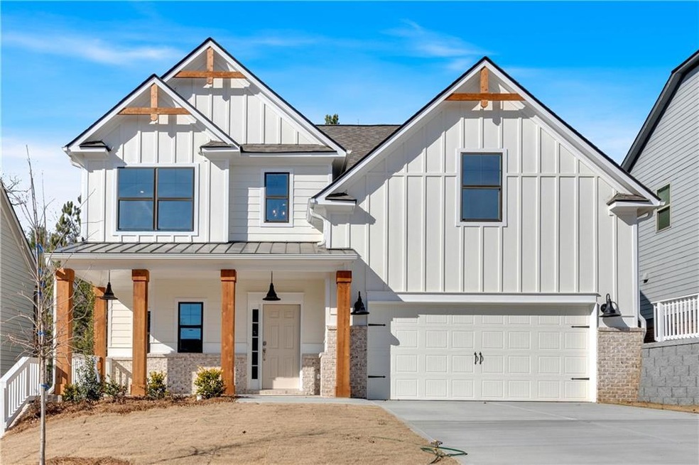 Modern farmhouse featuring board and batten siding