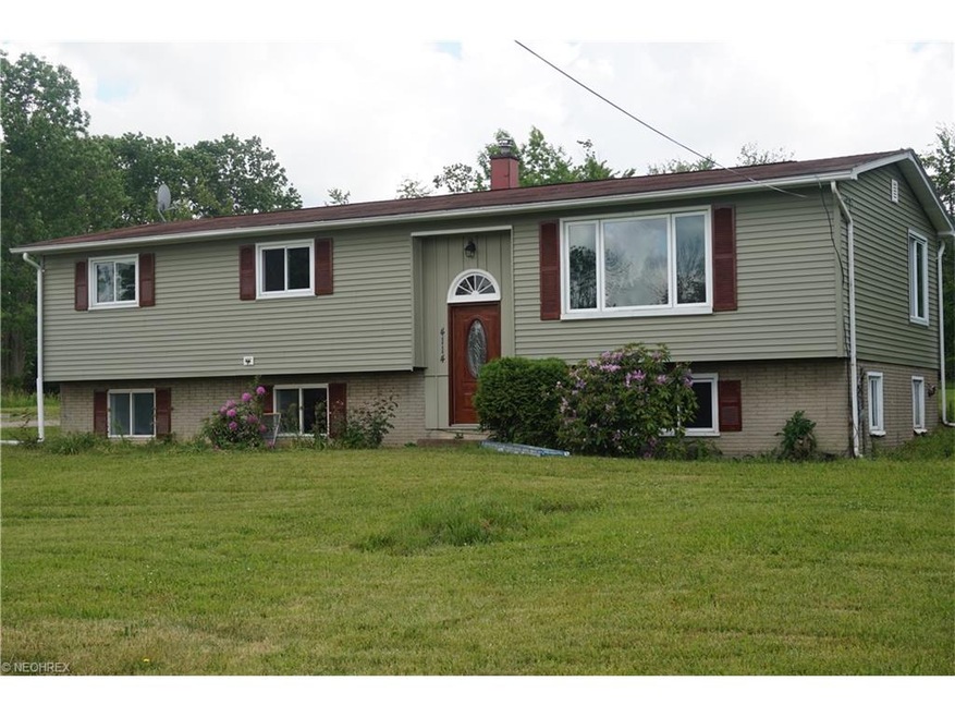 Front elevation of this totally renovated bi-level