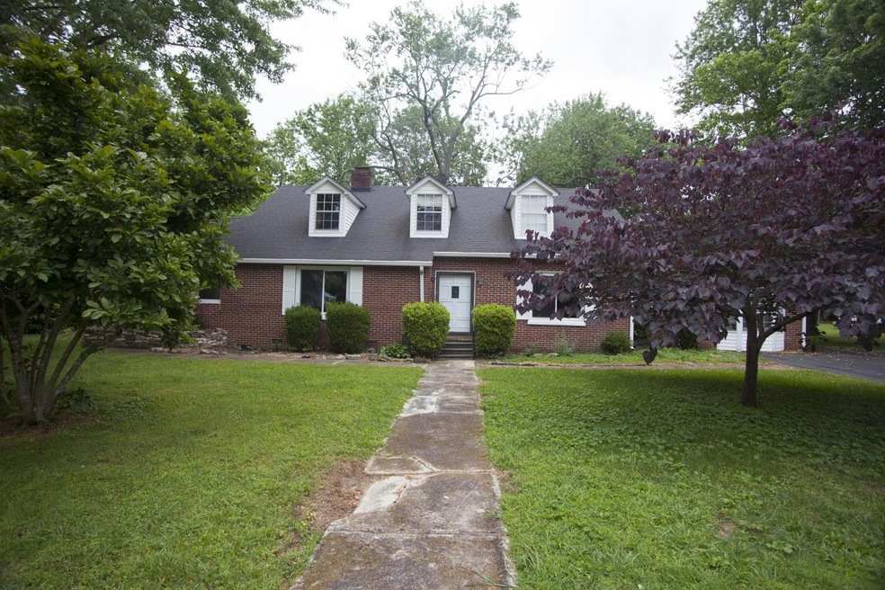 Quaint, cottage-style home nestled in the heart of the city.