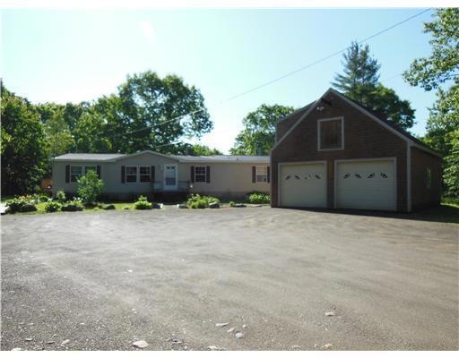 Exterior Front. Heated garage with...