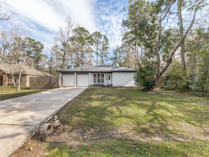 Charming single-story home with a spacious front y