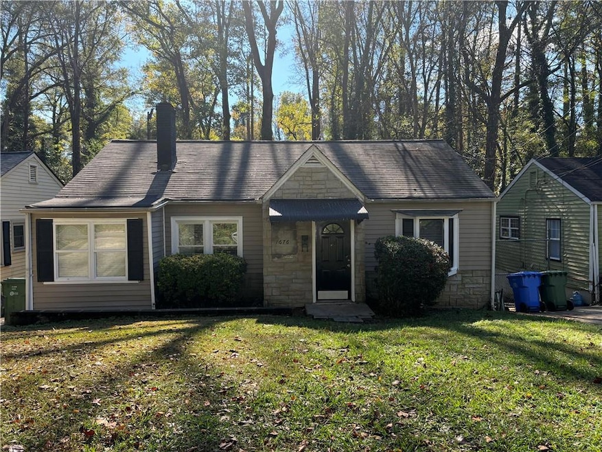 Ranch-style home with a front yard