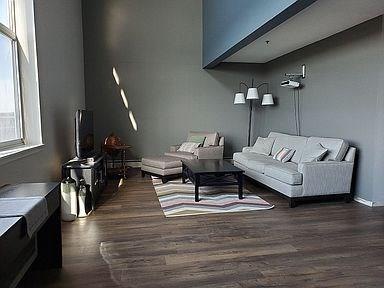 Large living room overlooking the Cedar River. Gre