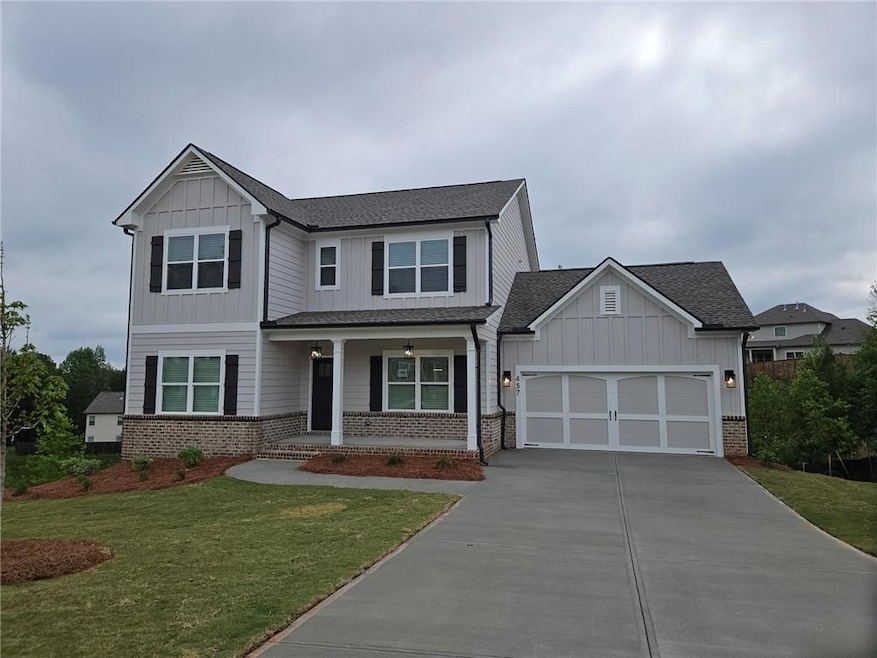 Craftsman inspired home featuring board and batten