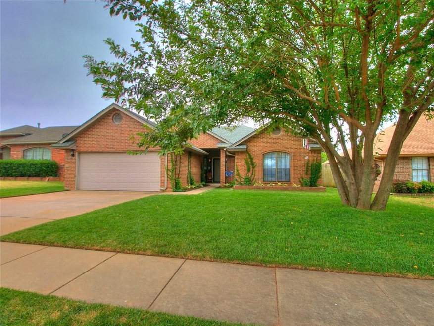 Front view of the house with fescue grass and ador