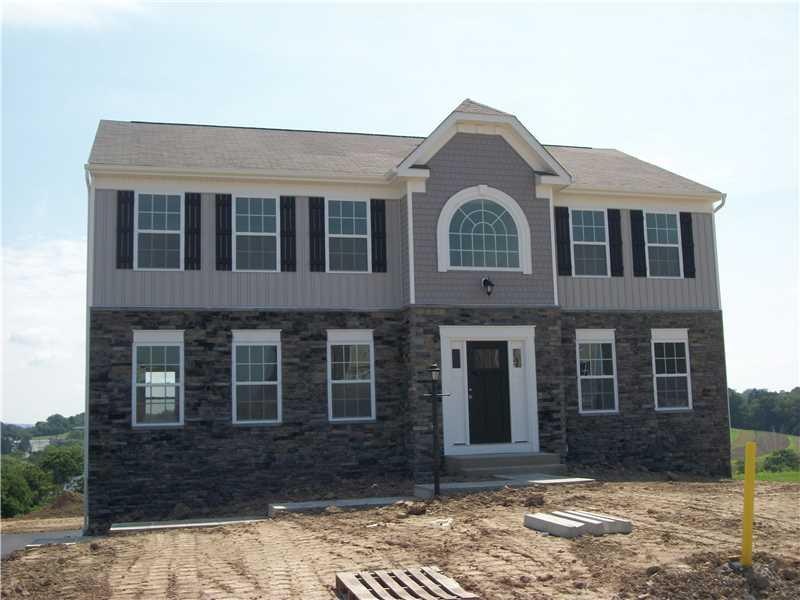 Exterior Front. New England Craftsman with 2 car r