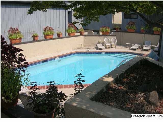 view of Pool from front porch of unit
