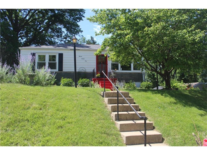 Beautiful home. It has a stone accent and red trim