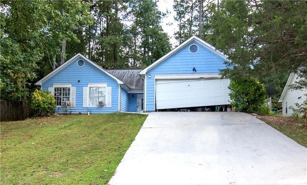 Single story home  and a front lawn