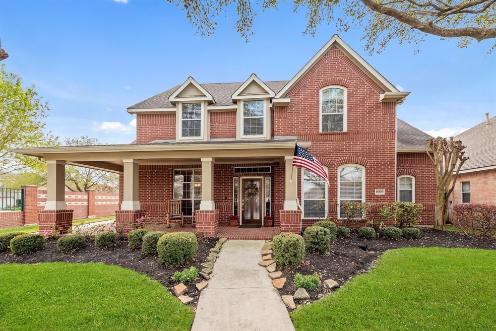 Pretty as a picture front elevation of this brick home.