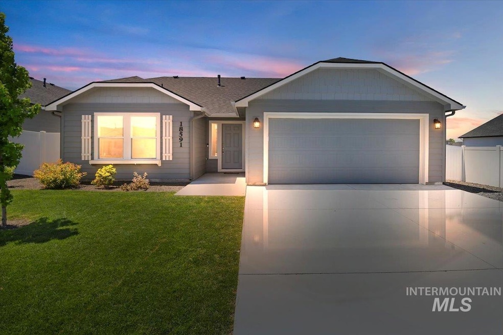 Single story home with an attached garage, concrete driveway, and a shingled roof