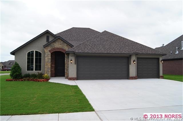 FRONT ELEVATION CORNER LOT STUCCO, STONE & BRICK