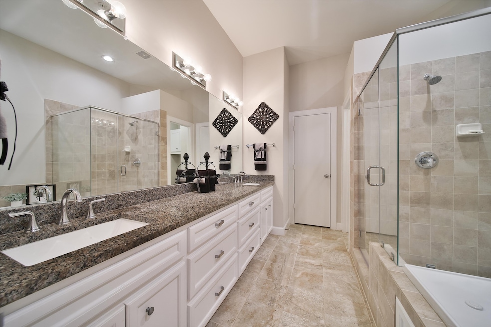 Luxury primary bath with dual sinks, jetted tub, s