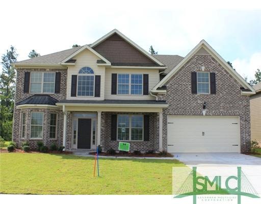 Exterior Front. Picture of Same Plan Completed on 