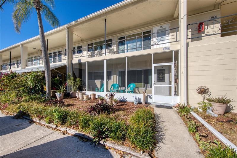 Front of the Condo with main enterance to the screened in porch.