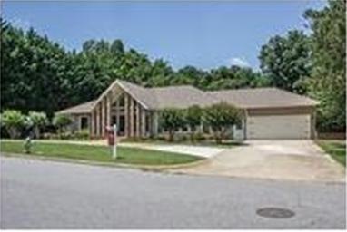 Round about Driveway and a level Front Yard!